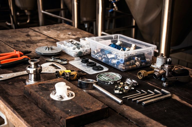 Plumbing tools on a table for home renovation and repair.